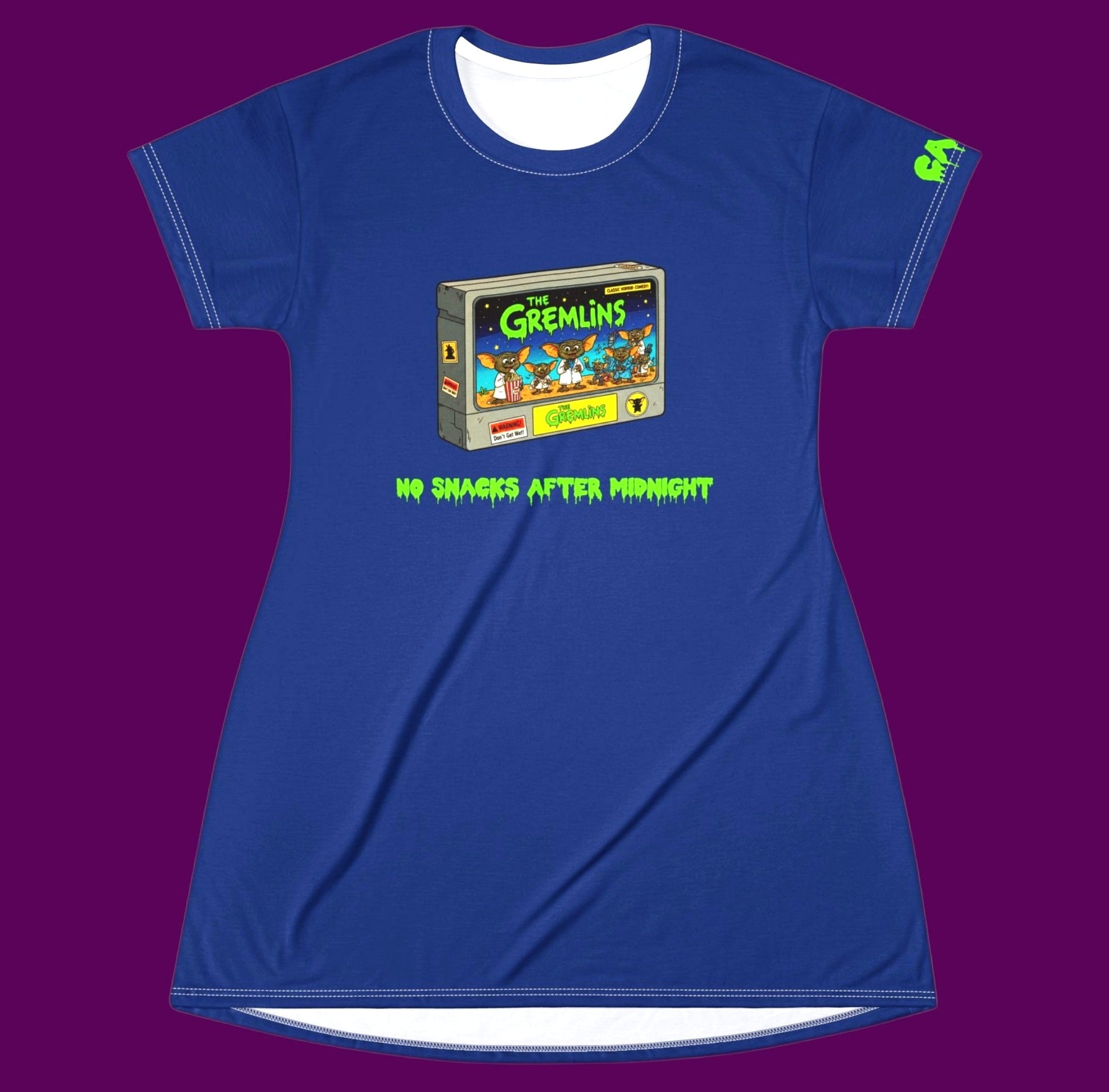 A custom blue No Snacks After Midnight Gremlin graphic nightshirt dress featuring a retro 1980s VHS tape illustration with cute Mogwai monsters on it. Sold in The Fright Factory New Orleans gift shop.
